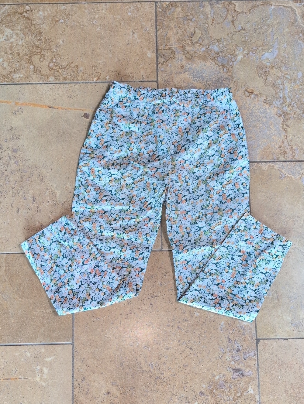 Cyrillus girl's Liberty print pants. Green, orange, white floral. Size 10.